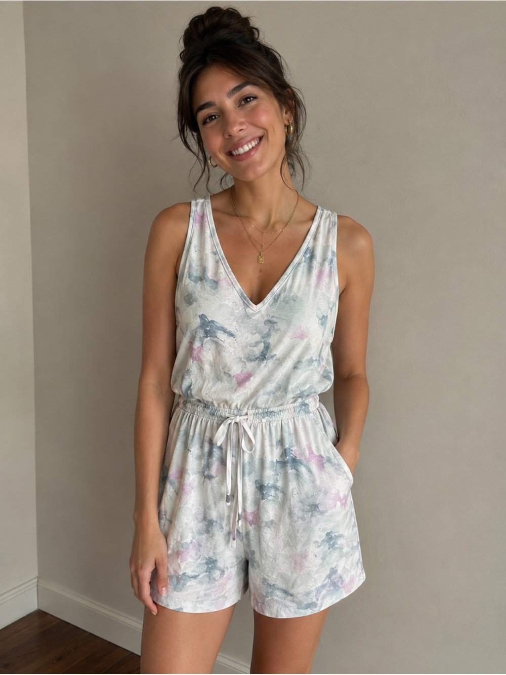 Travis Mathew Pastel Floral Print Romper in Light Blue and Lavender